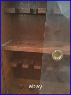 Walnut 24 smoking pipe hanging display cabinet with original sliding glass doors